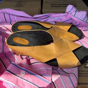 Woman’s slip on leather sandals, can’t find size so I’m guessing 9.5-10